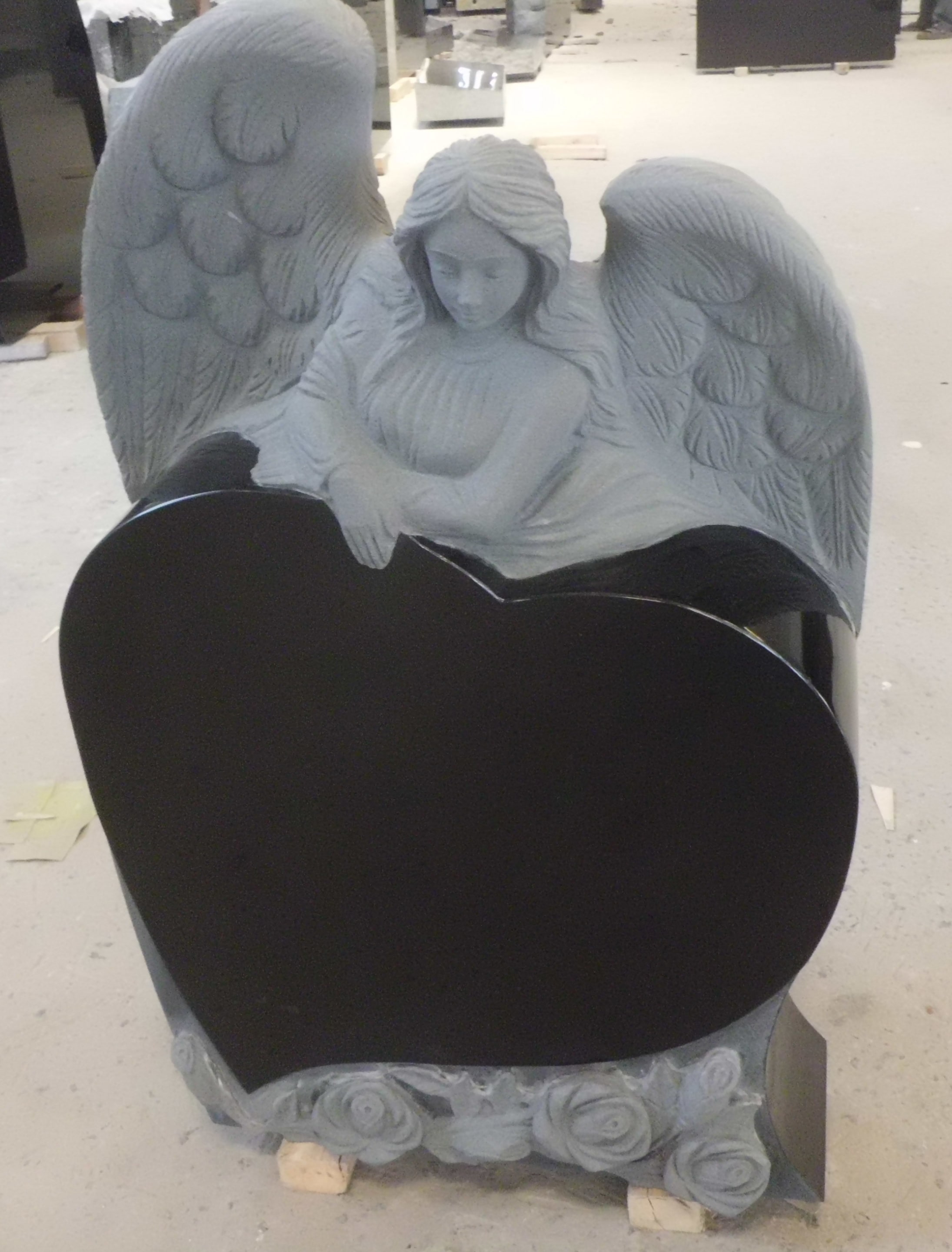 Carved Granite Angel Sculpture